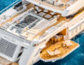 Main deck, aft: The eye-catcher is the pool with a glass floor and a capacity of 11,000 litres. If you take a dip there, you can look out through the glass bulwark aft