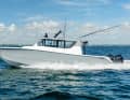 The shipyard's new model has an enclosed deckhouse for the first time