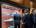 The guests look at the exhibits.