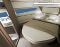 There is a large double bed below deck in the bow.