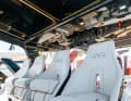 The shipyard installs four sports seats at the driving position.