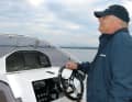 The boat has a sports steering wheel with hydraulic steering