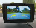 This is how the image reaches the driver. The colour markings help to correctly estimate distances