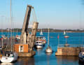Pleasure craft pass the bascule bridge to the transverse canal