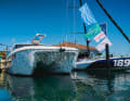 The power catamaran Makai 37 is moored next to a sailing yacht on the jetties of the ancora Marina.