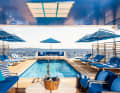 It's so blue: the pool aft on the main deck measures ten by four metres. The accessories around it - from parasols to cushions - are all in shades of blue