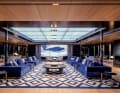 Salon-loft on the owner’s deck: the distance between the Tai-Ping silk carpet and the backlit ceiling is 3.70 metres. The 18-square-metre LED display is also ...