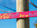 Painted with a brush, like this sign with beach philosophy