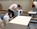 Everyone has to pitch in: the preparations for painting require teamwork