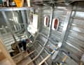 Fascinating: the view of the shiny metal structures of a fuselage.