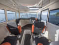 Bella 700 Raid: four seats in the deckhouse, access to the slip berth