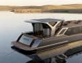The stern has an exciting design and is reminiscent of a standard motorboat with a lounge and an overhanging roof.