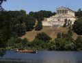 The replica Roman patrol boat "Fridericiana Alexandrina Navis" sails past the Valhalla near Regensburg on its journey to the Black Sea.