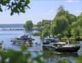 Charter boats meet at the Baumgartenbrücke.