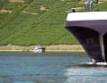 Commercial vessel and pleasure craft.