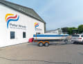 Our refit boat in its original form. The old gelcoat is faded and full of damage