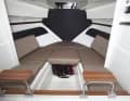 Pegazus 560 Top Fisher: seating area converts into a berth