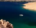 Around the island of Pag in a chartered cabin cruiser.