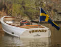 The yacht stern and tumblehome are reminiscent of commuter yachts on the US East Coast.