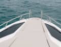 The minimalist foredeck offers a sunbathing area for at least two people.