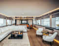 Wide lounge: cream-coloured ensemble of couch and armchairs by Flexform. The dining chairs with Foglizzo leather upholstery were made by the in-house joinery