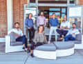 Teamwork: Part of the creative team from the "Team for Design - Enrico Gobbi" studio on the studio terrace by the canal in the Venice district of Mestre