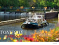 The large number of locks and weirs on the canalised Blavet River determine the pace of a boat trip through Brittany