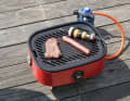 The grill is large enough to barbecue with a crew of four