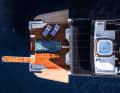 From above: Large expanses of solar panels can be seen glinting here and there between the pools.