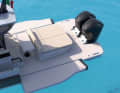 The stern of the TYKUN XII, with its folding side panels, offers a huge sun deck.