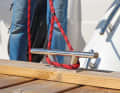 With a strong tug on the boat hook, the line slips out and the boat is held fast