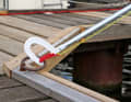 It is best to hook into a ring when it is lying or standing over an edge. It is difficult to hook into a horizontal ring from above