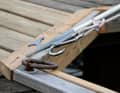 The smaller model sits somewhat loosely in a guide rail, and you have to be careful that the carabiner ...