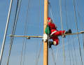 Figure of St Nicholas on the rigging of a sailing boat.