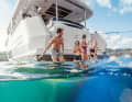 Guests jump into the water at the rear