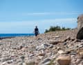 Original experiences: Walk along the stone beach at Øitangen on the island of Jomfruland