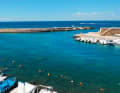Entrance and pier of the harbour of San Giorgio in Gallipoli