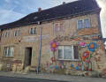 The "Loitz Banksy": a local street artist brings colour to the village. The free open-air gallery in Loitz.