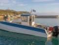 With a small deckhouse as a fishing boat version.