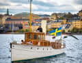 The "Alba II" demonstrates its maritime heritage with an oversized Swedish flag