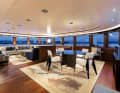 Upper deck saloon: Numerous seating areas invite you to relax. A large TV extends from the centre chest of drawers