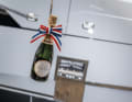 The champagne is flying towards the hull