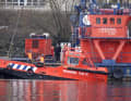 The emergency services recover the mooring boat