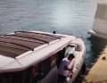 In the first part of the video you can still see someone on board releasing the lines.