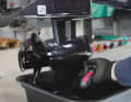 Loosen the lower screw, the drain plug.