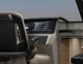 Modern Garmin technology dominates the driver's cab