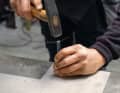 A targeted centre punch prevents the drill bit from slipping when drilling in stainless steel