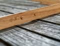 The batten clearly shows how differently the wood has weathered and washed out from decades of scrubbing. The epoxy resin would form lakes in these valleys, so they have to be levelled out