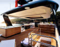 Sundeck: Under the electric sliding roof installed in the hardtop, there is a Jacuzzi, a bar and a dining table next to the outside steering position.