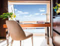 Working with a view: if required, the owner can enlarge his master suite on the main deck by hydraulically folding down a balcony at the touch of a button.